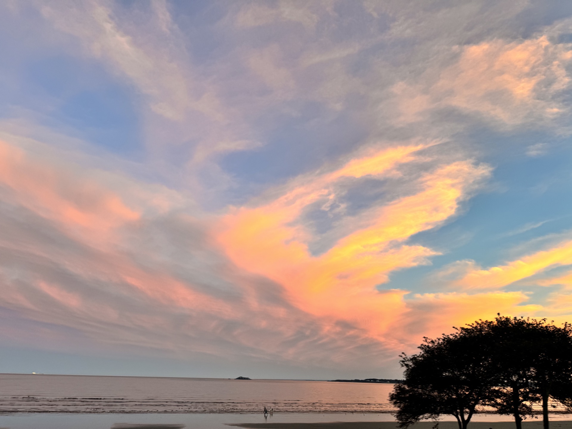 Fiery sunset over churning surf at Nahant Beach