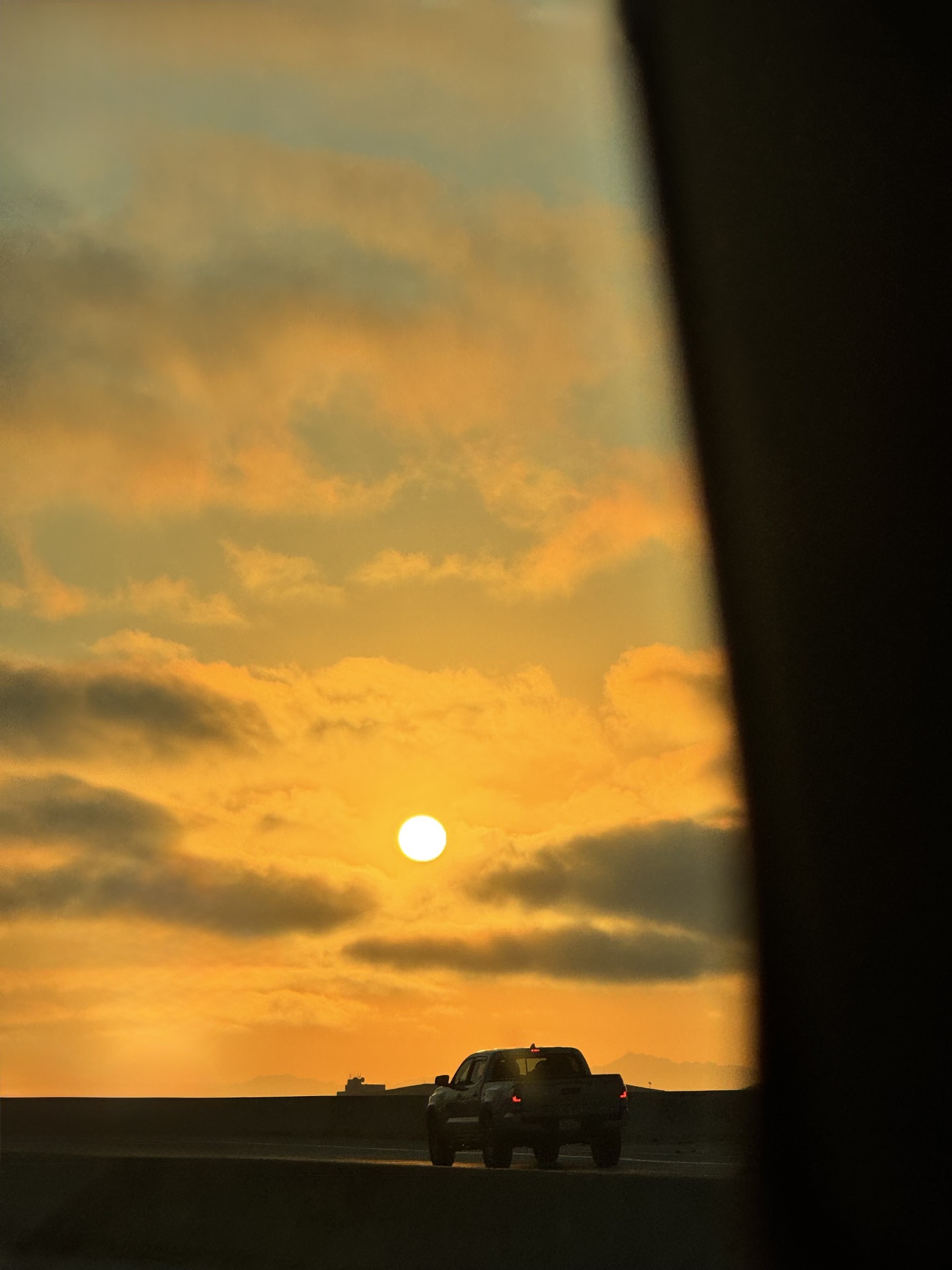 Electric storm building above an Indian cityscape